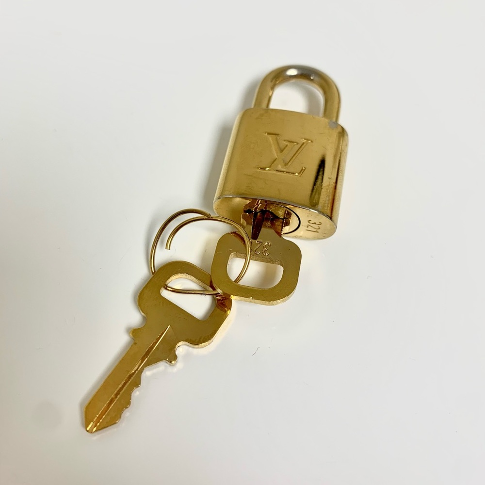 Louis Vuitton Authentic Lock - Picture 10 of 10